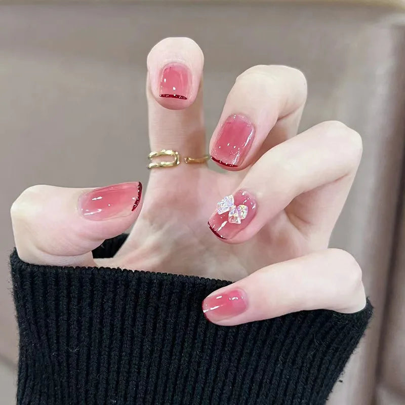 Decorated nail designs shown on hands