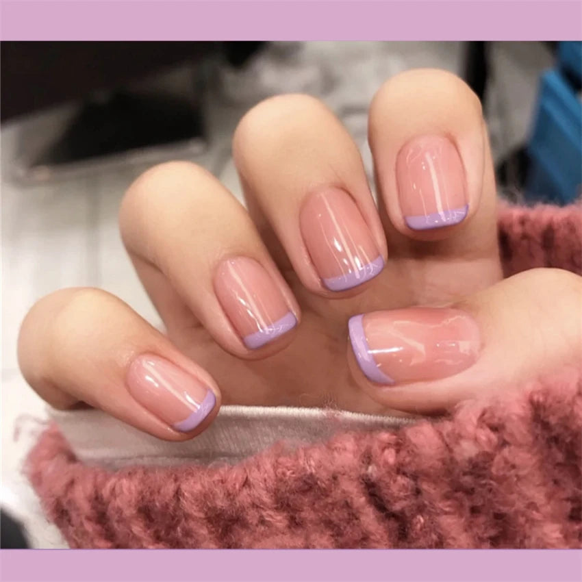 Decorated nail designs shown on hands