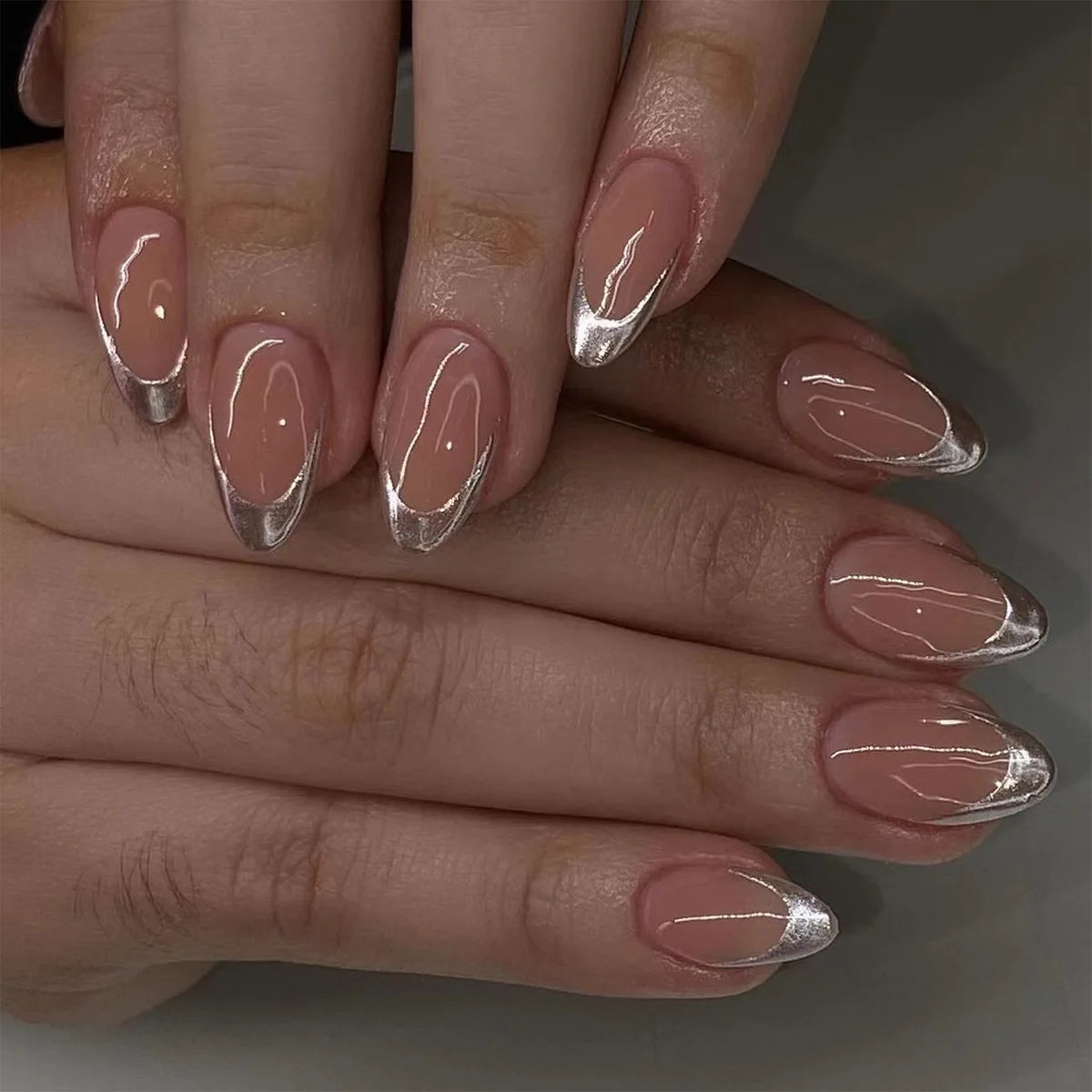 Decorative nail designs shown on hands
