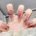 Decorated nail designs shown on hands