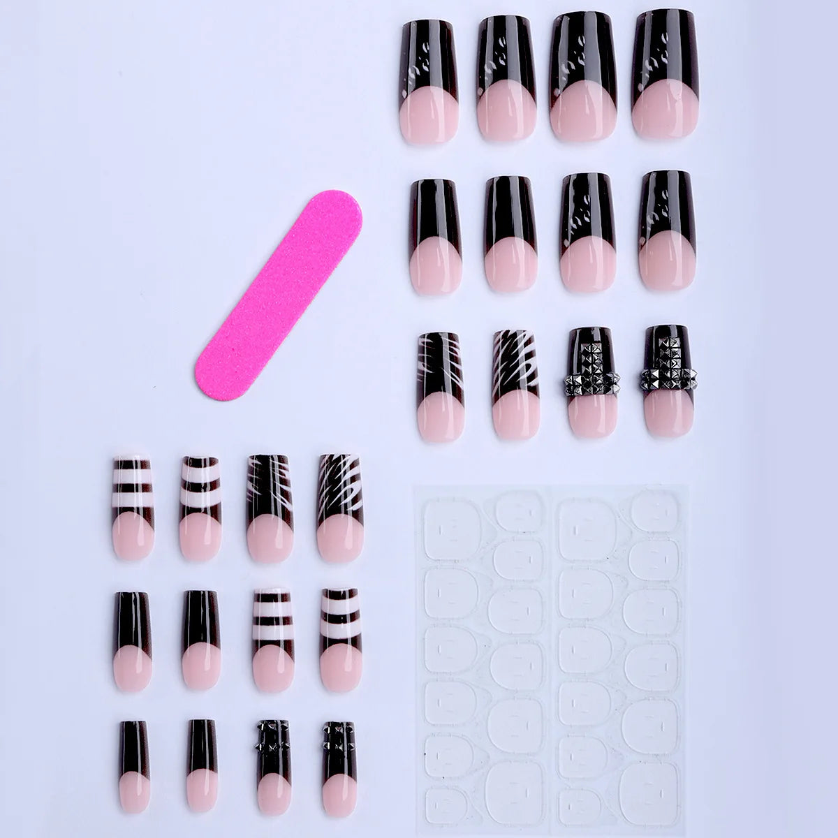 Black and nude press-on nail set arranged in rows