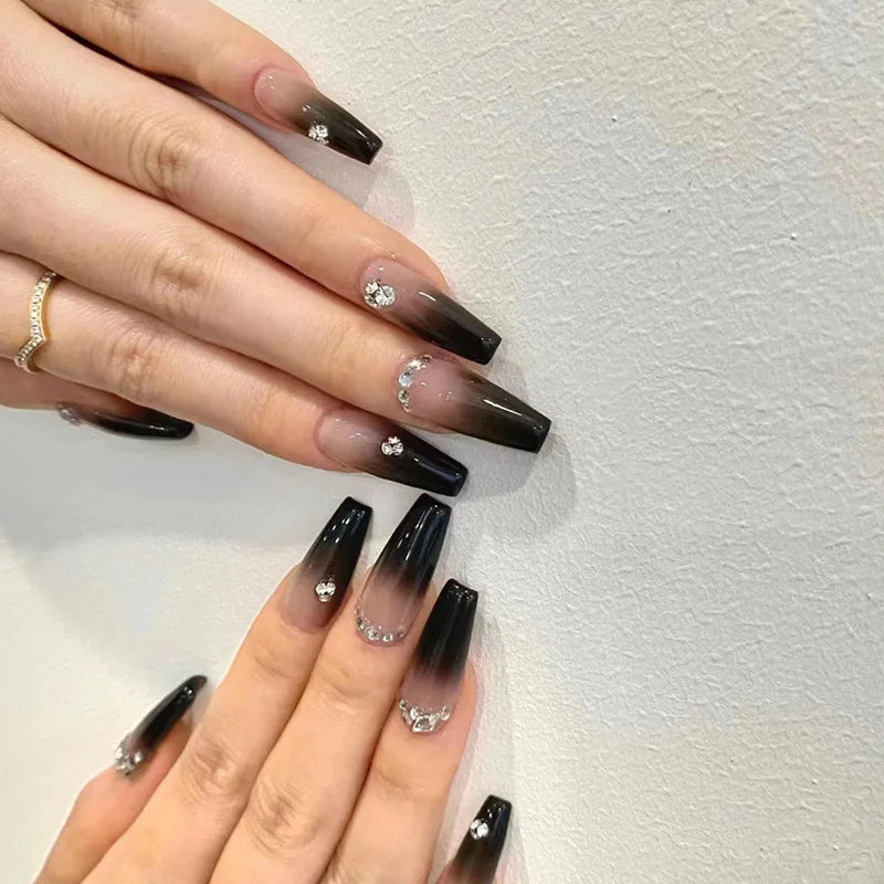 Decorated nail designs shown on hands
