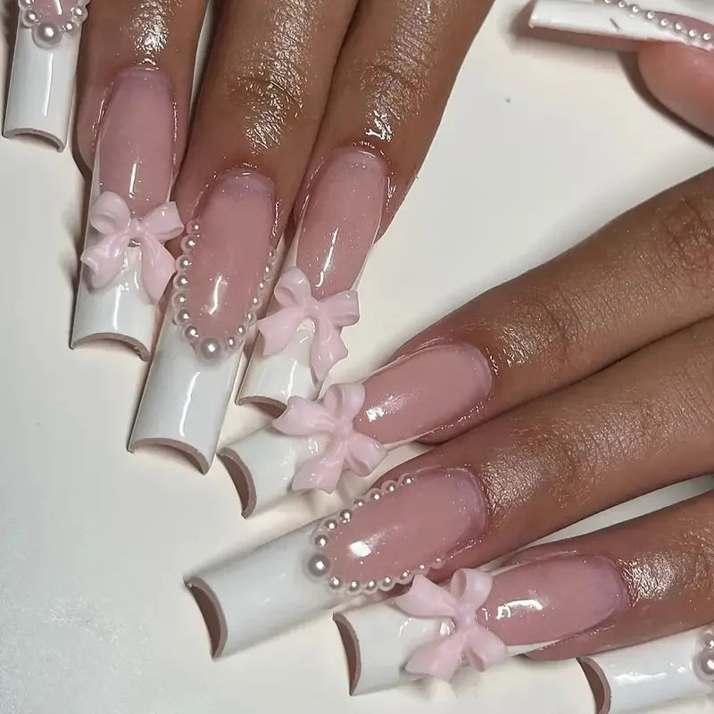 Decorated nail designs shown on hands