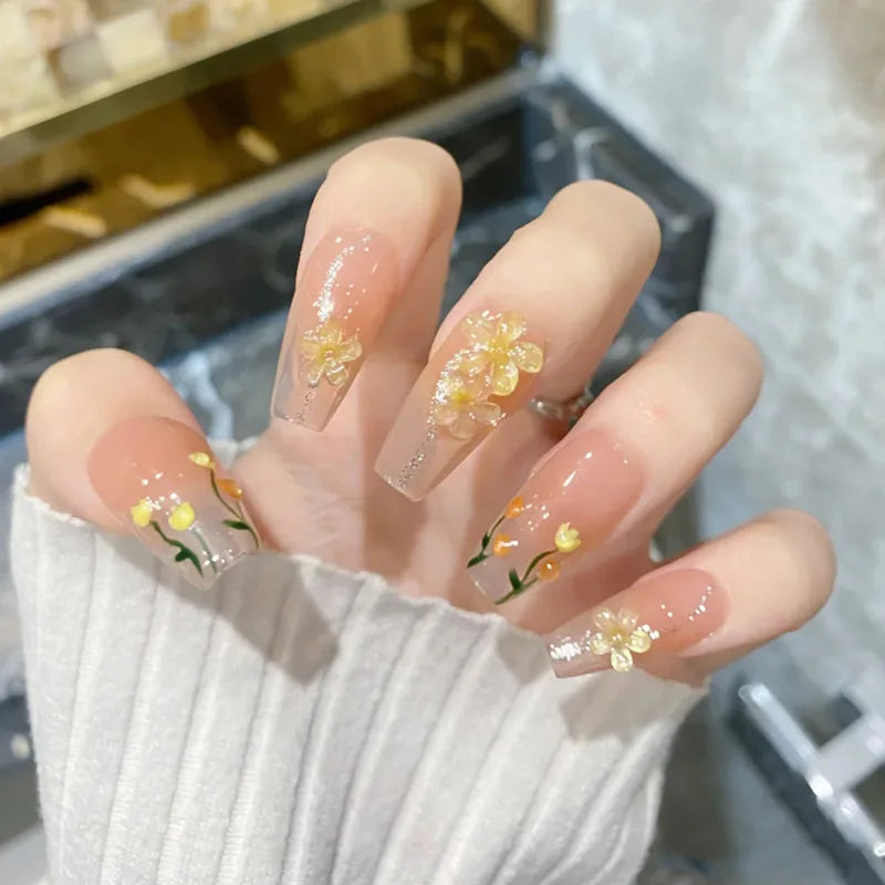 Decorated nail designs shown on hands