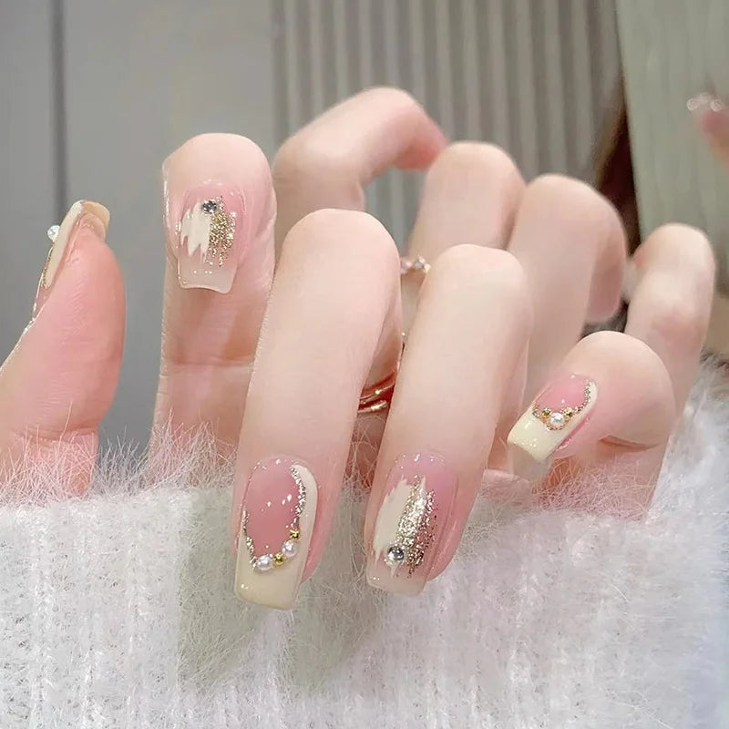 Decorated nail designs shown on hands