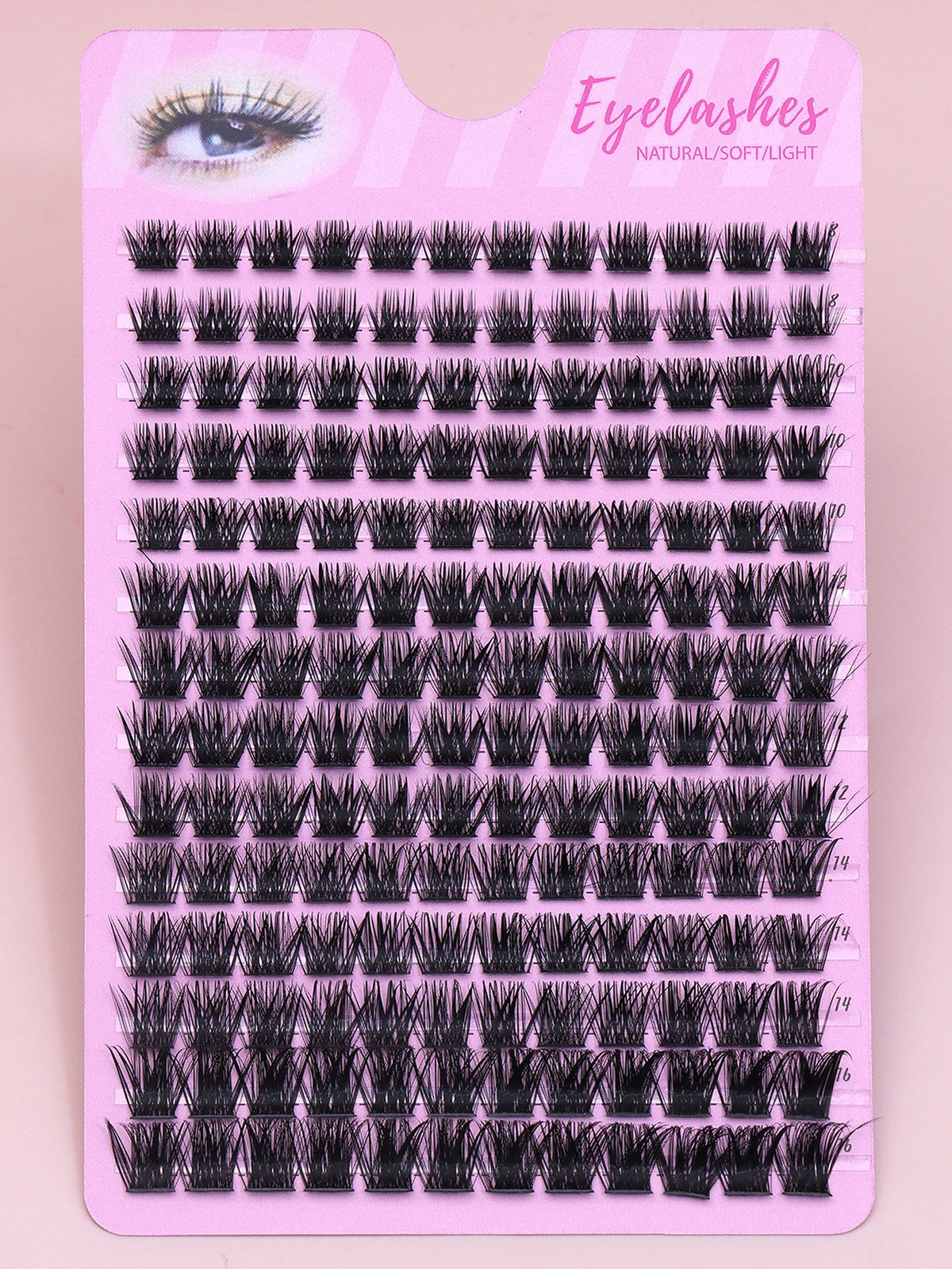 False eyelash clusters arranged in rows in a tray