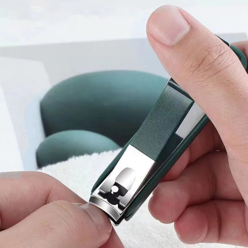 Manicure tools in a green case with nail clipper detail views