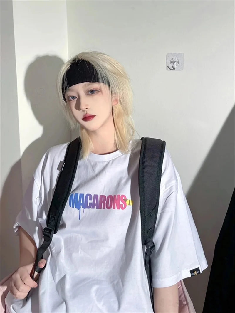 Layered mullet wig shown in black and light-colored styling examples