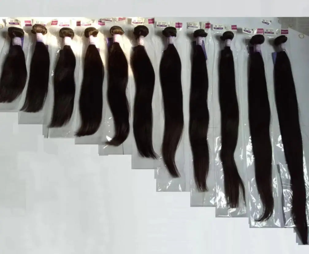 Dark hair bundles displayed side by side in different lengths