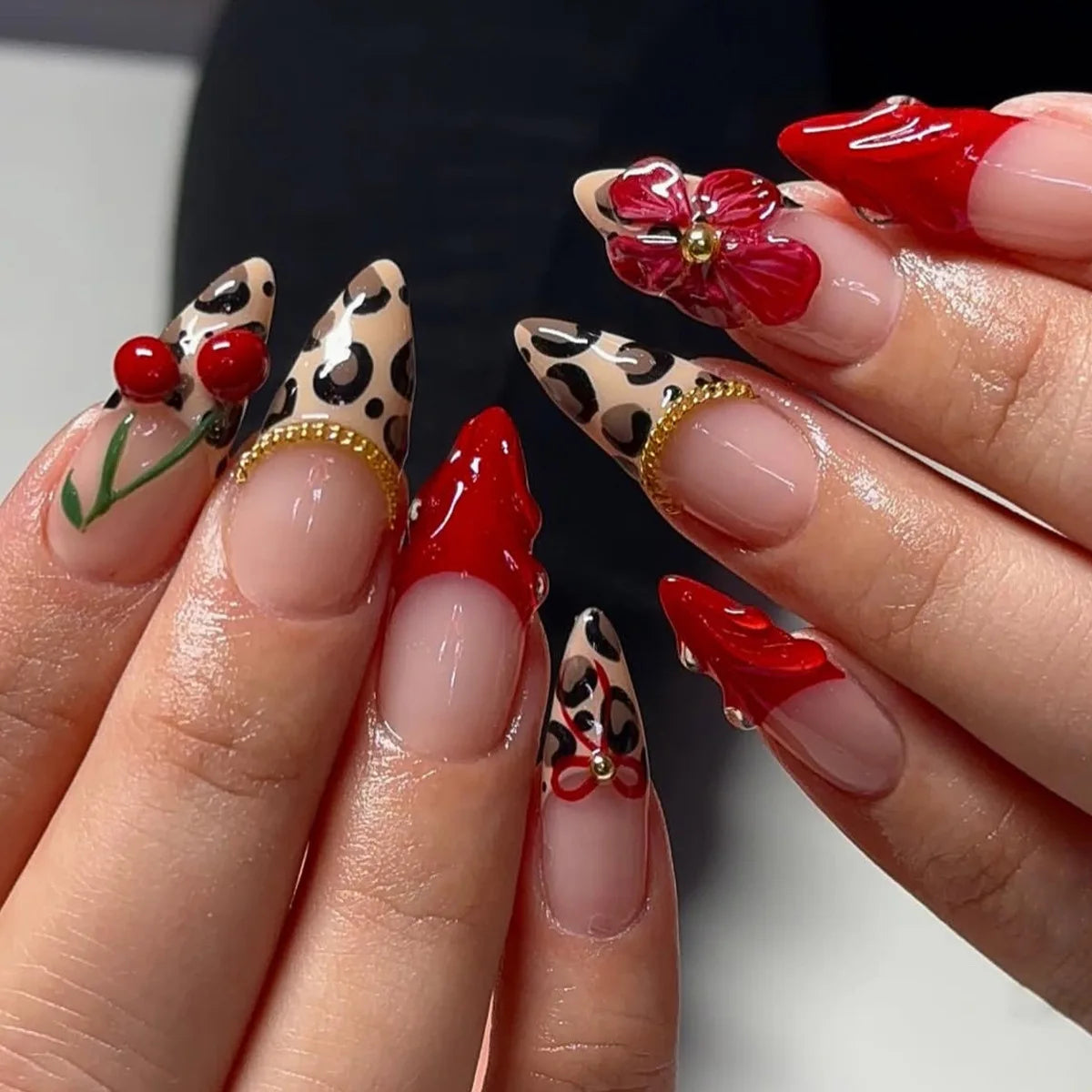 Decorated nail designs shown on hands