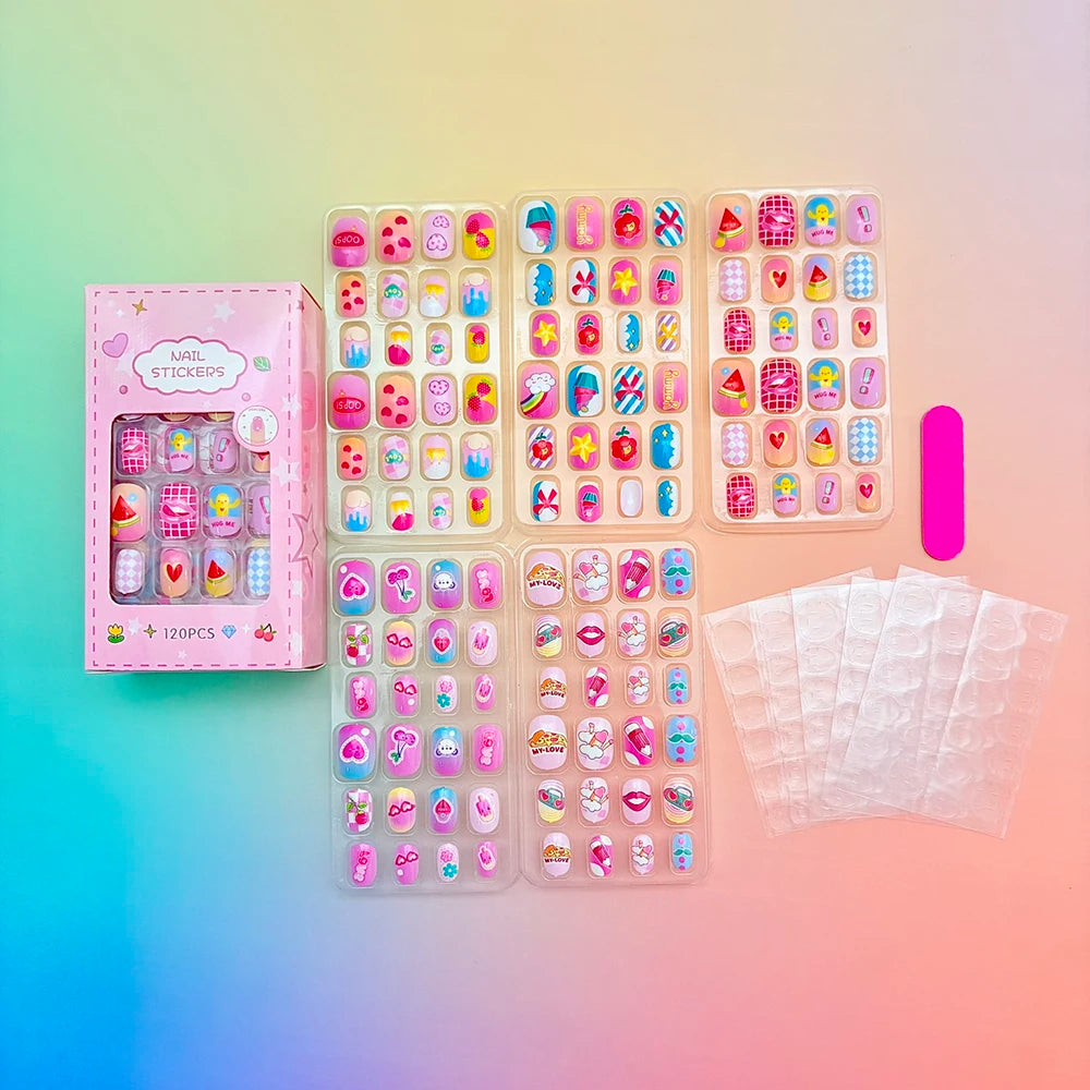 Assorted colorful press-on nails with packaging and manicure accessories