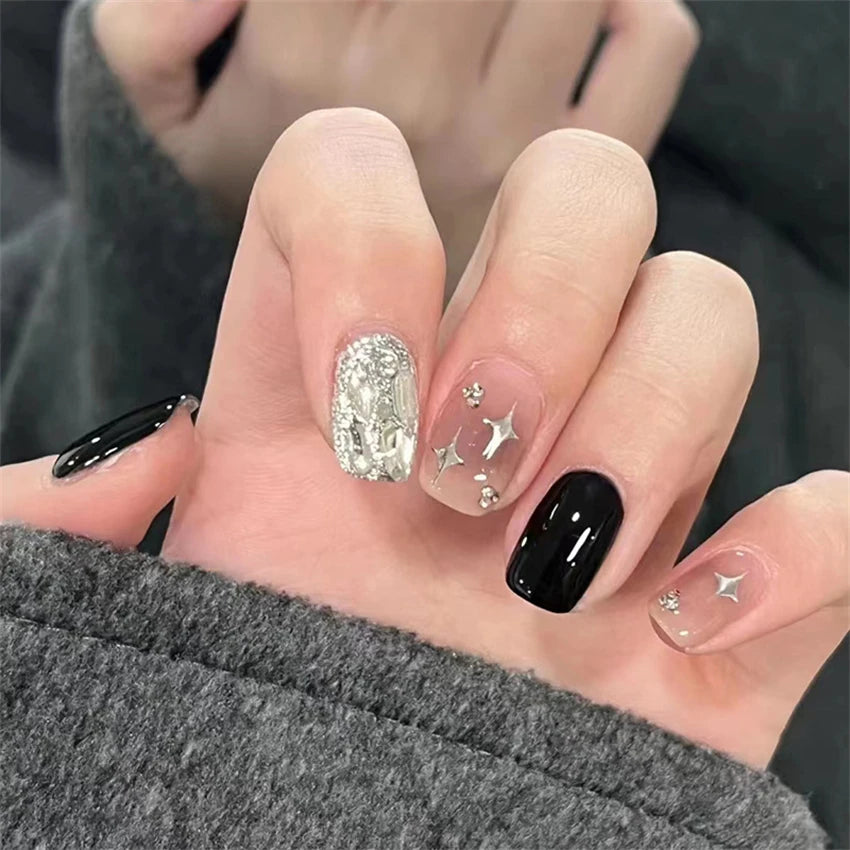 Decorated nail designs shown on hands