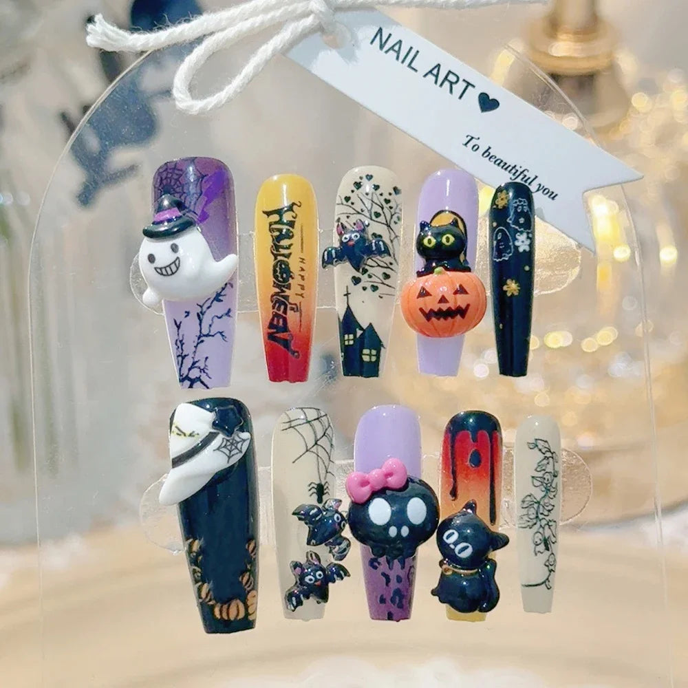 Decorated press-on nail sets with raised embellishments on display cards