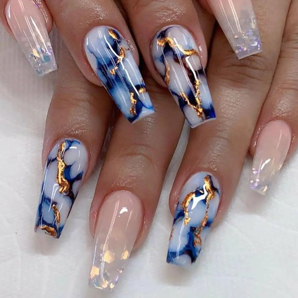 Decorative nail designs shown on hands