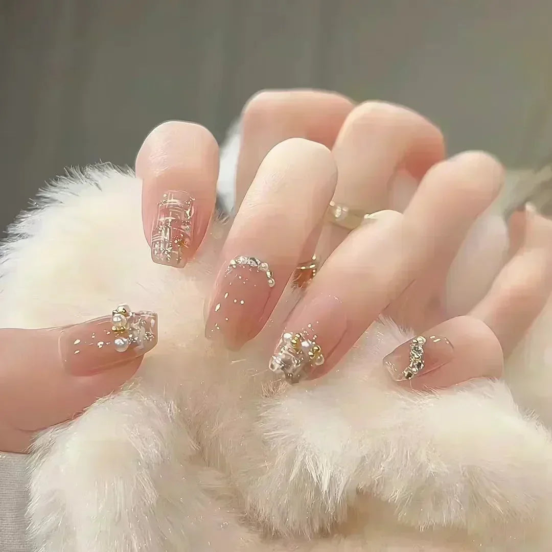 Decorated nail designs shown on hands