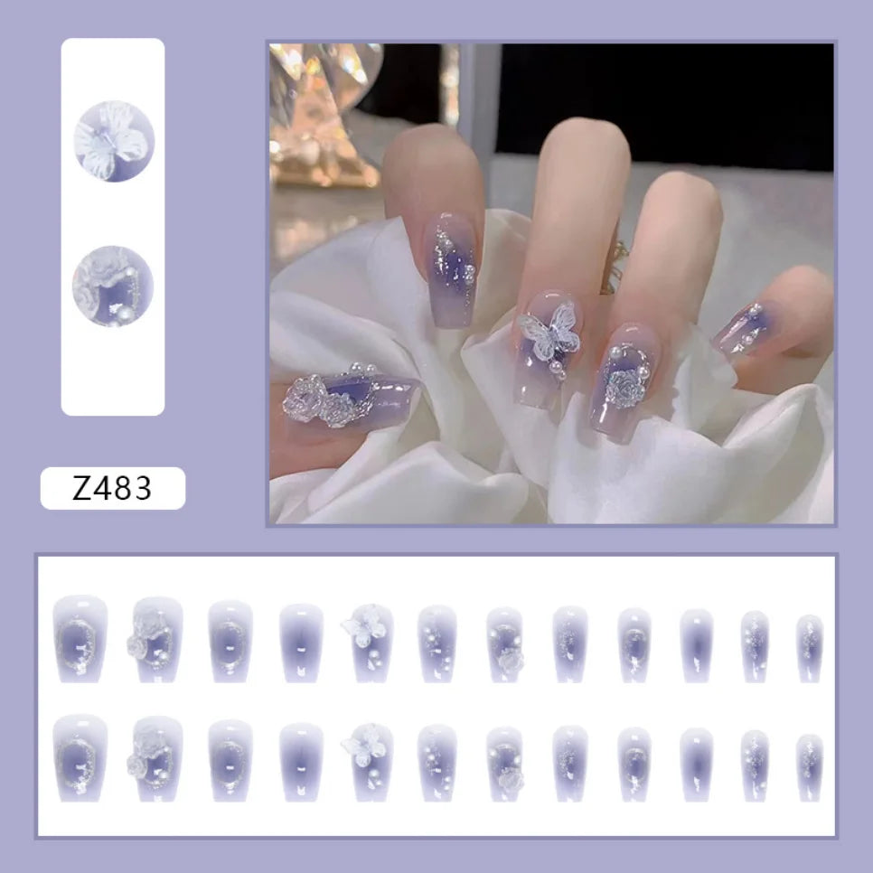Purple press-on nail set with manicure example