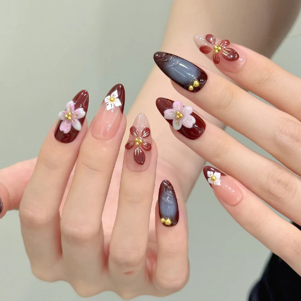 Decorated nails shown on hands
