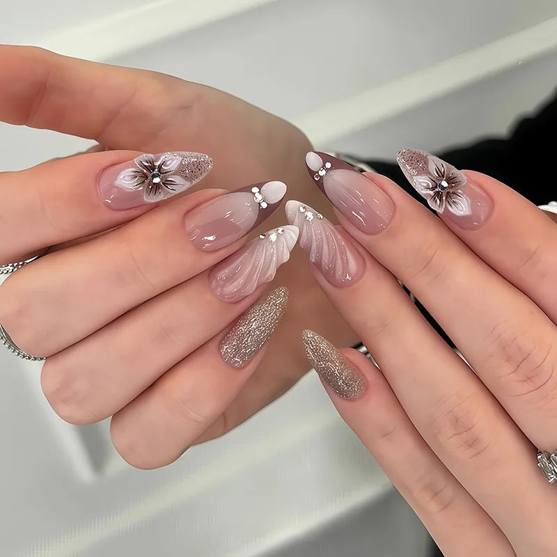 Decorated nails shown on hands