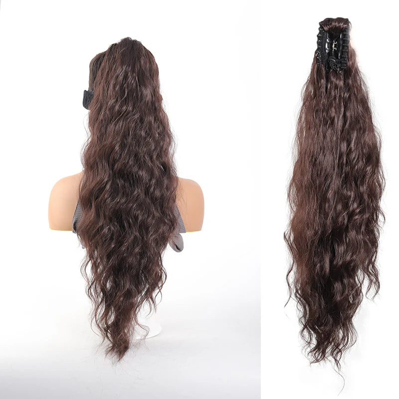 Long wavy ponytail extension shown on a mannequin and laid out