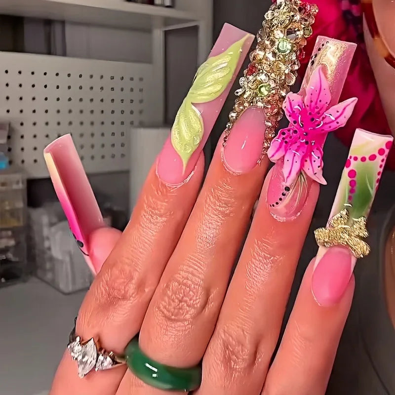 Long colorful decorated nails shown on hands