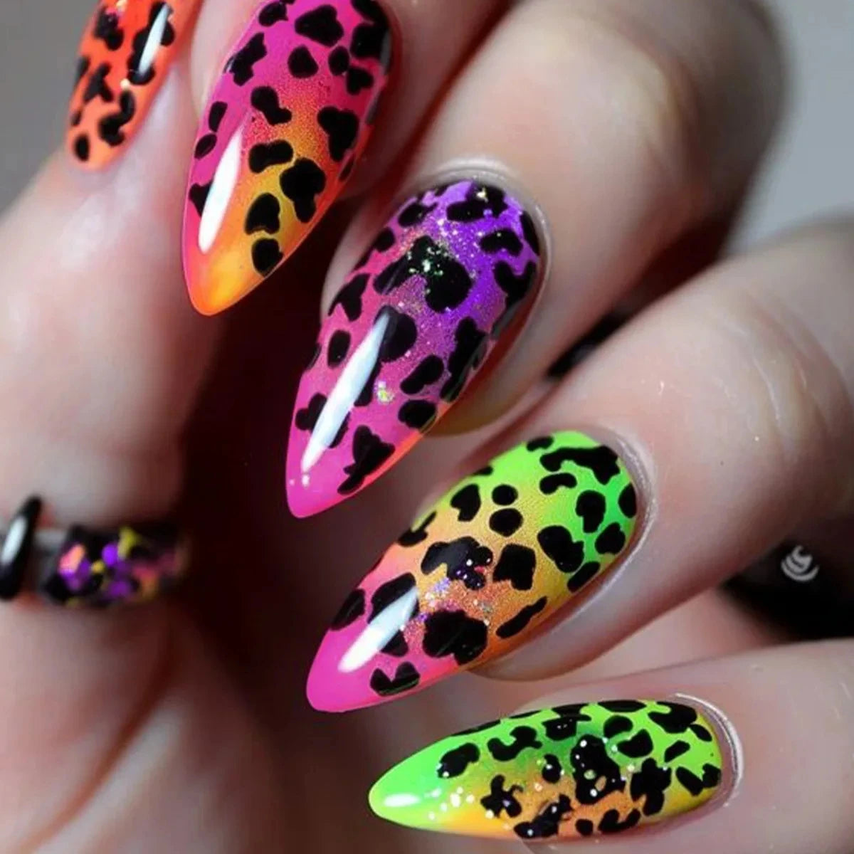 Decorative nail designs shown on hands
