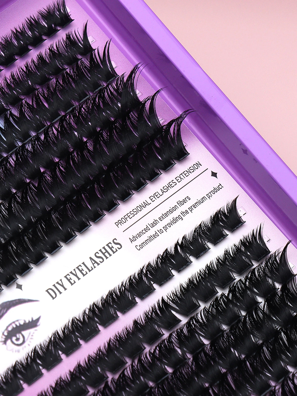 False eyelash clusters arranged in rows in a tray