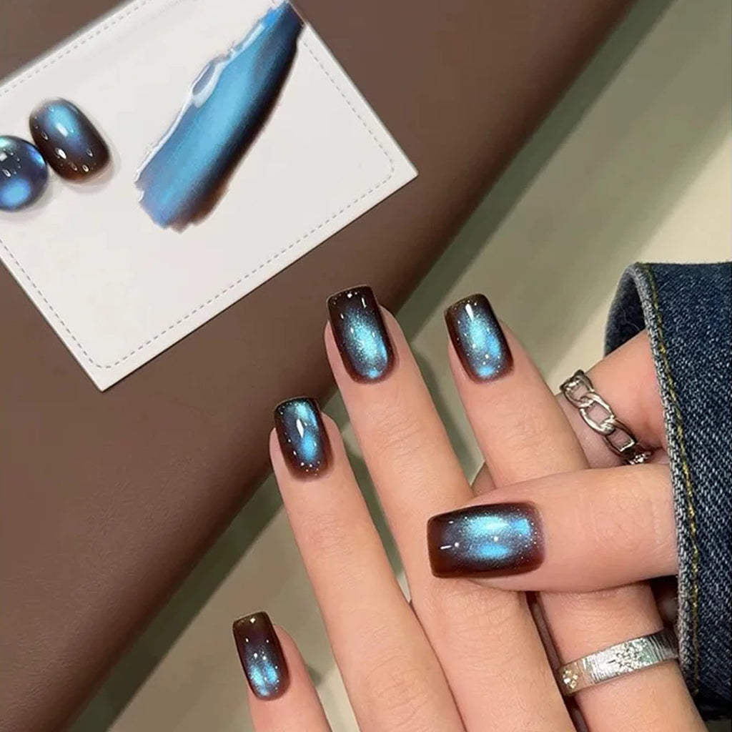 Chrome-finish nails shown on hands