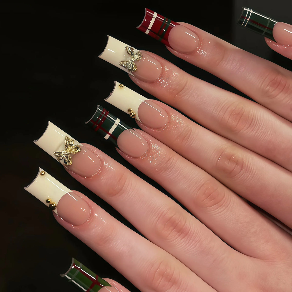 Decorated nail designs shown on hands