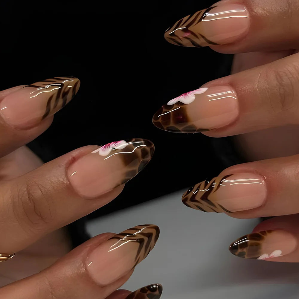 Decorated nails shown on hands