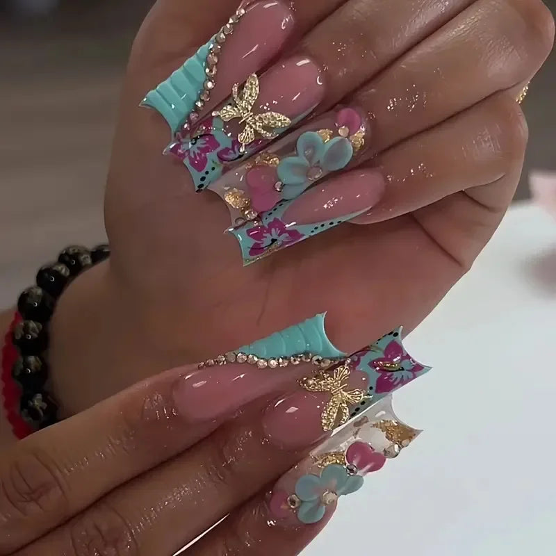 Decorated nail designs shown on hands