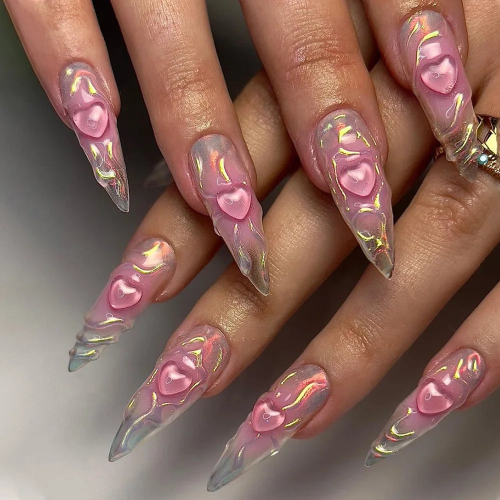 Long decorative nail designs with raised accents shown on hands