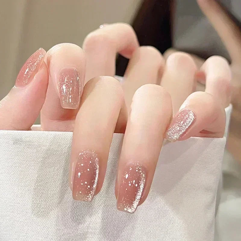 Decorated nail designs shown on hands