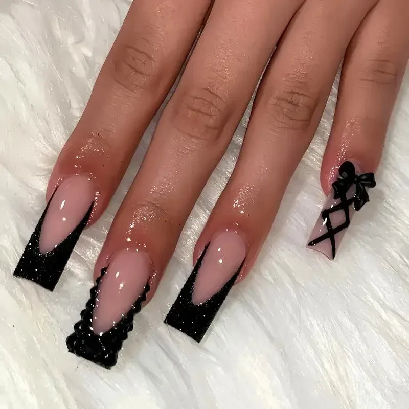 Decorated nail designs shown on hands