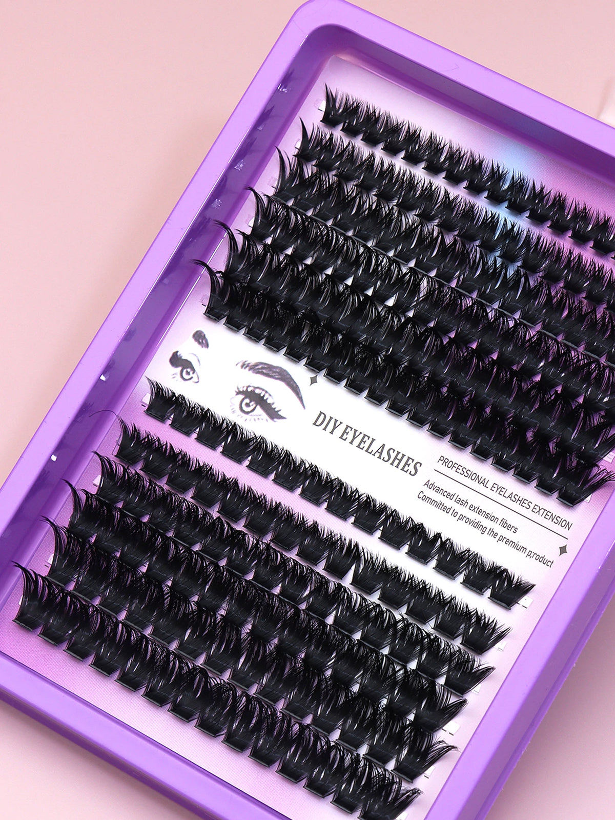 False eyelash clusters arranged in rows in a tray
