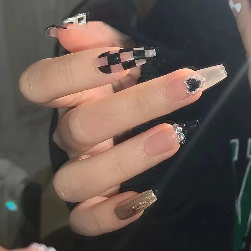 Decorated nail designs shown on hands