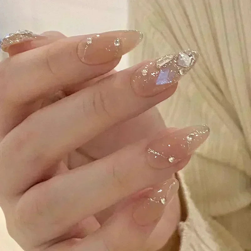 Decorated nail designs shown on hands