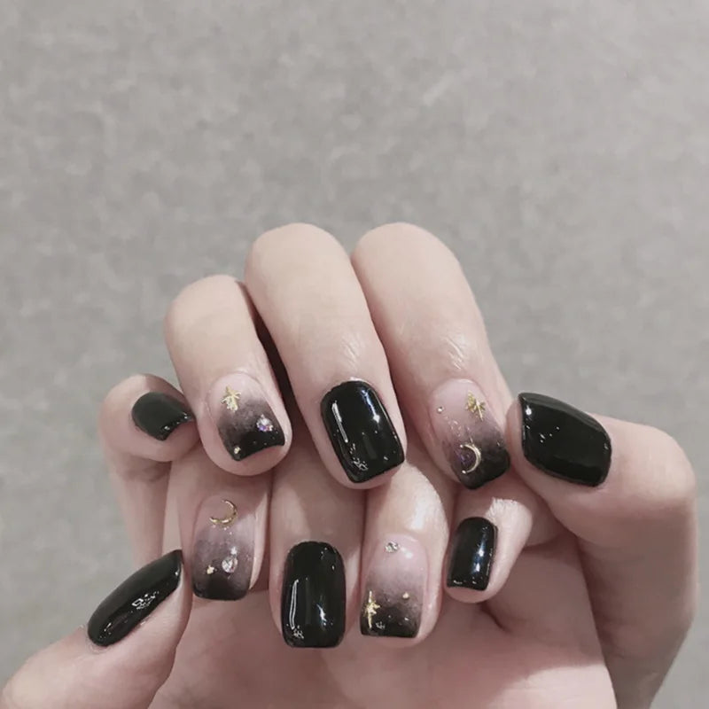 Decorated nail designs shown on hands