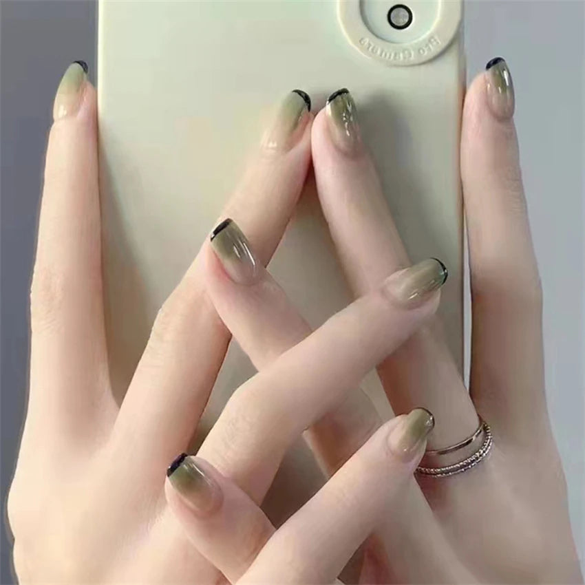 Decorated nail designs shown on hands