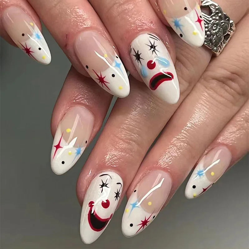 Long decorated nail designs shown on hands