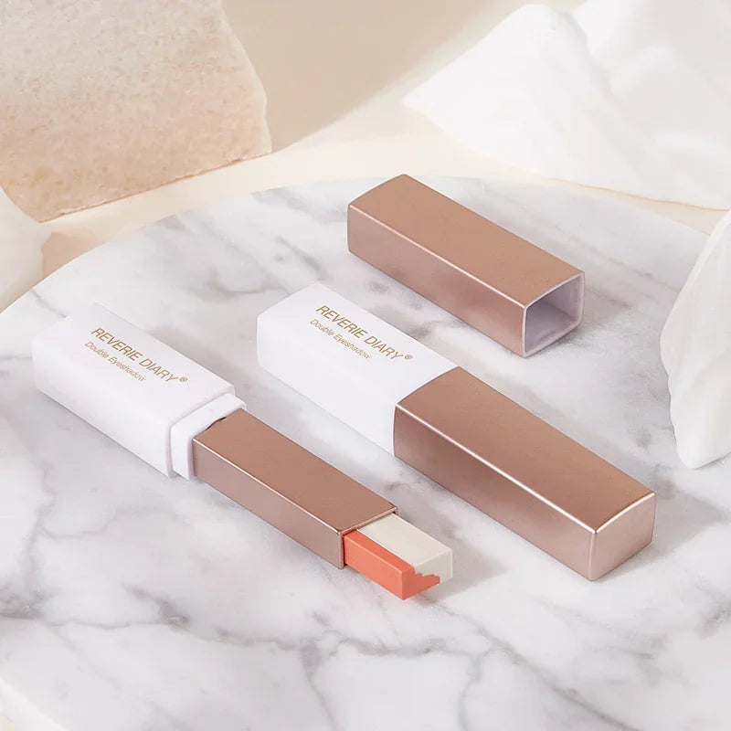 Dual-color eyeshadow sticks and packaging