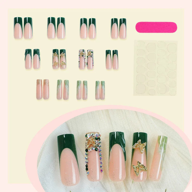 Green and gold press-on nails arranged with set contents