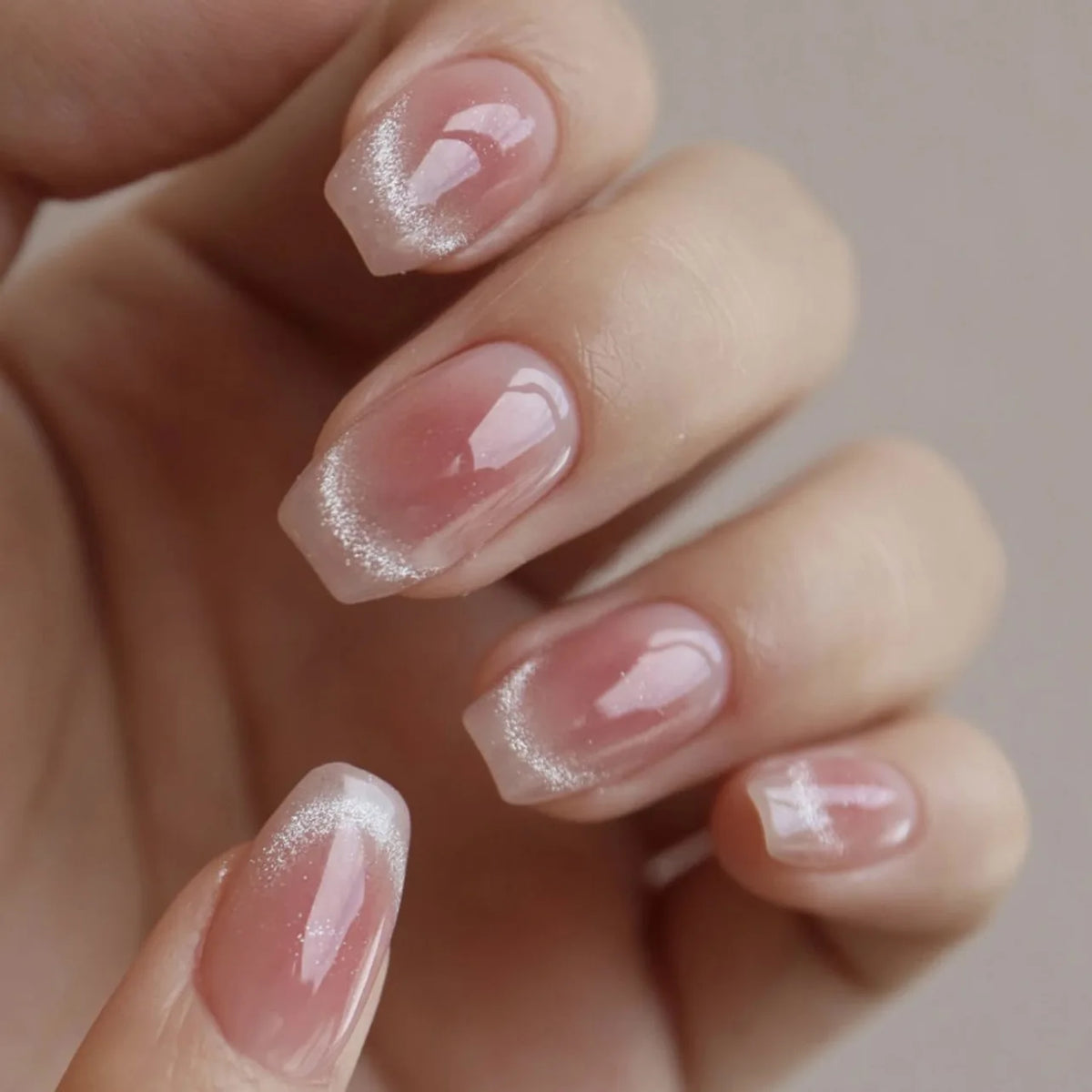 Decorated nail designs shown on hands