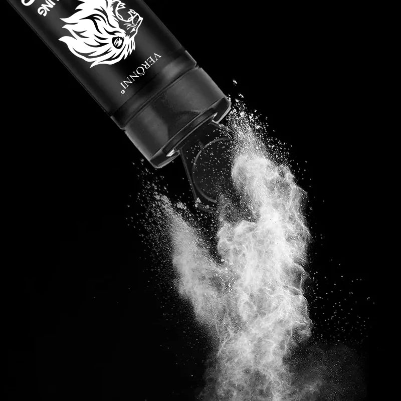 Hair styling powder being poured from a bottle