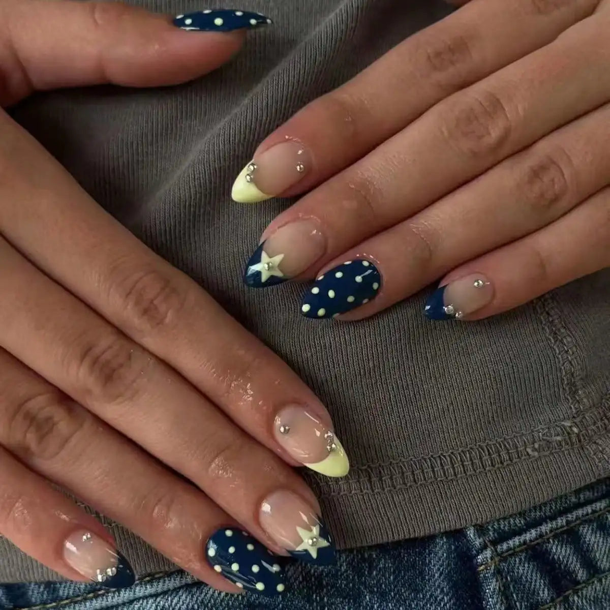 Decorative nail designs shown on hands