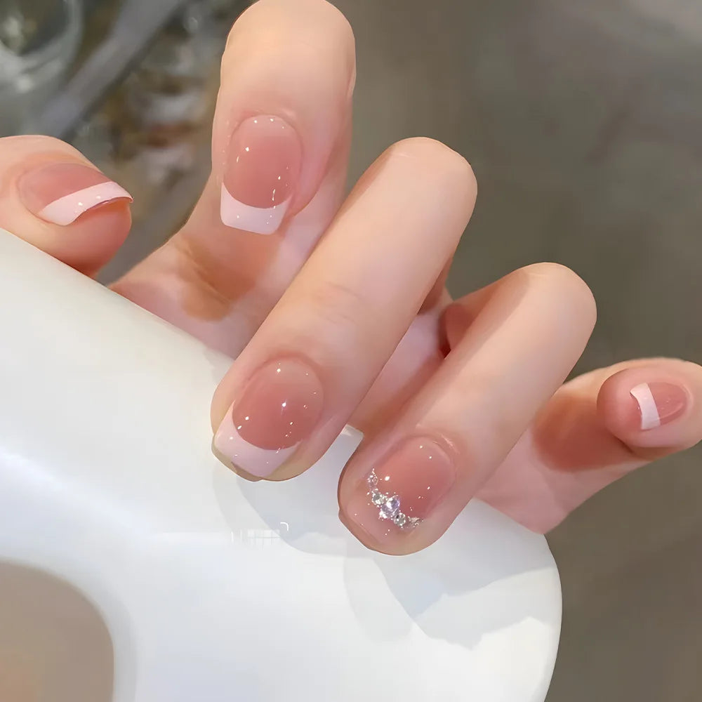 Decorated nail designs shown on hands