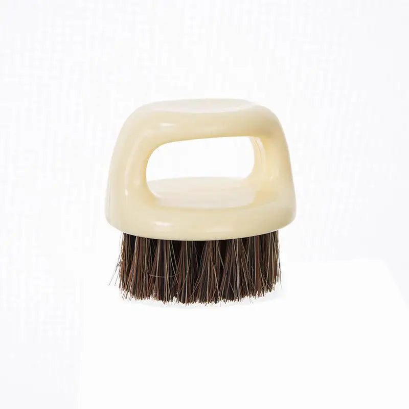 Palm grooming brush showing handle and bristles