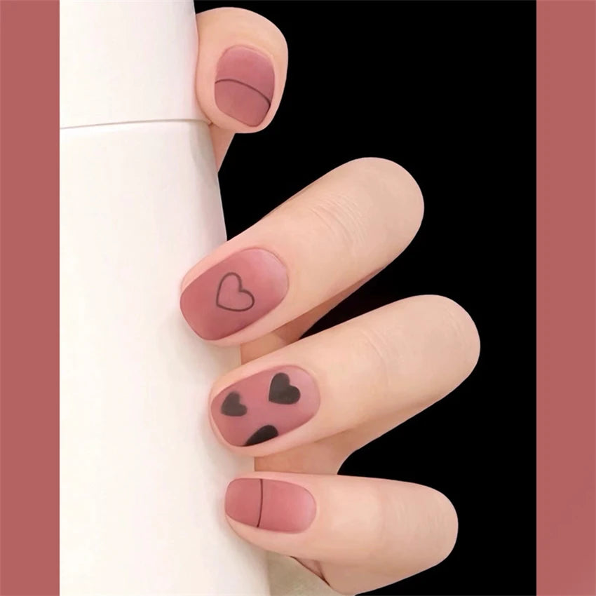 Decorated nail designs shown on hands