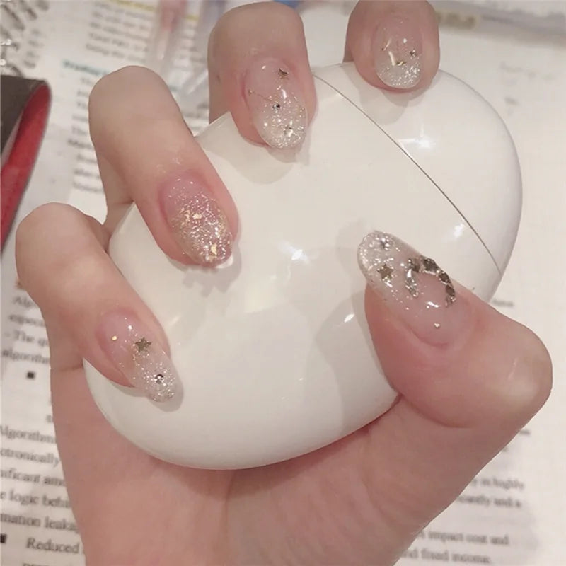Decorated nail designs shown on hands