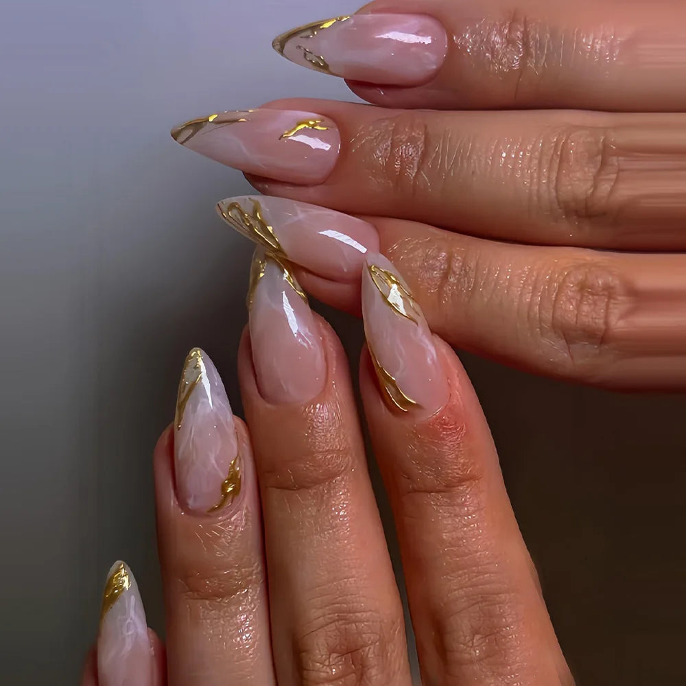 Long decorative nail designs with raised embellishments shown on hands