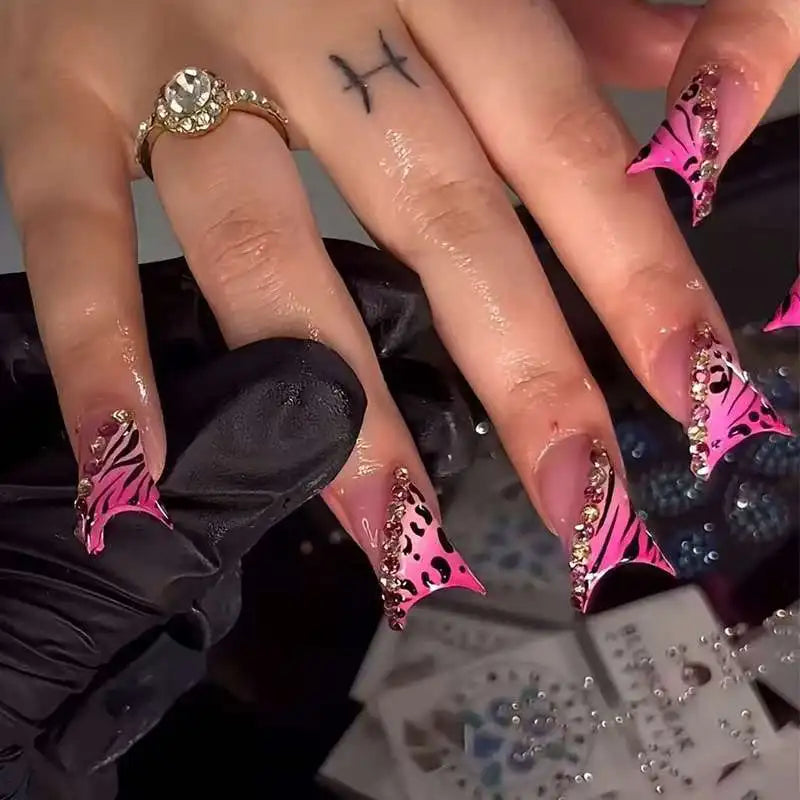 Decorative nail designs with raised accents shown on hands